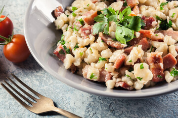 Spaetzle with fried bacon and onion