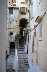 White stairs and old houses in medieval small touristic coastal town Sperlonga, Latina, Italy on sunrise