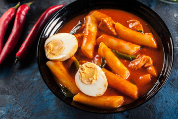 Spicy tteokbokki, korean rice cake with boiled egg