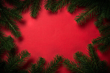 Christmas flat lay background with fir tree and decorations.