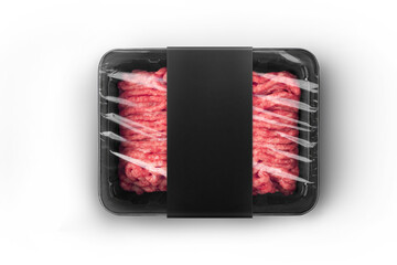 Black sealable plastic tray with black paper label filled with fresh raw minced meat top-view....
