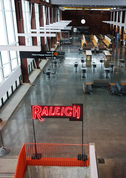 RALEIGH,NC/USA - 3-21-2020: The interior of Union Station train depot in Raleigh, NC, with a neon Raleigh sign