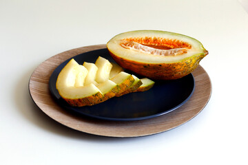 Ripe juicy melon, cut into wedges