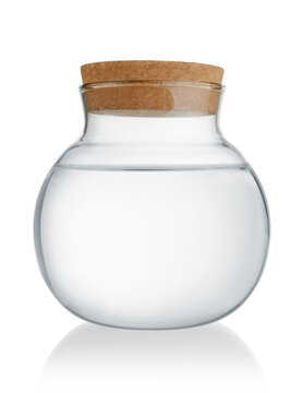 Round glass bottle with corc isolated.