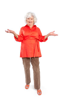 A senior elderly woman in a red blouse isolated on a white background.