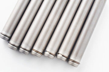 Set of cylinders of pistons isolated on white background. Spare parts for high-pressure devices,...