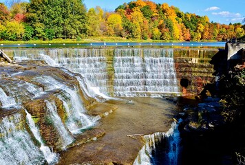 Beebe lake dam waterfalls. The Beebe Lake is a sanctuary of water, woods, and wetlands in the the heart of the Cornell Campus in Ithaca, New York.