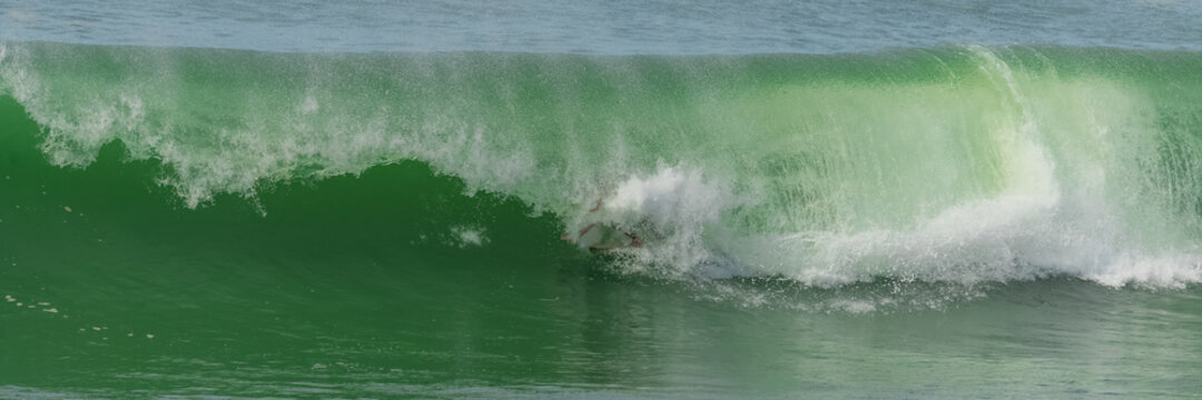 Surfer in a big wave, Anglet in the pays basque, France