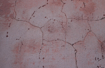 Obraz premium Pink wall. Cracks. Concrete texture. Background.