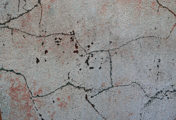 Pink wall. Cracks. Concrete texture. Background.