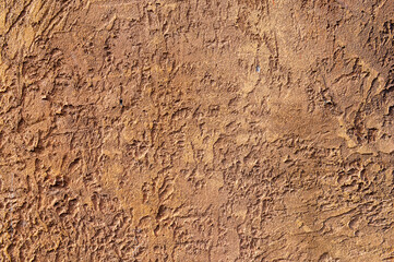 Brown Texture of the Walls with Small Stones, artificial plaster.