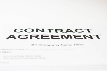 Contract contract on a white table. Financial calculation for homework.