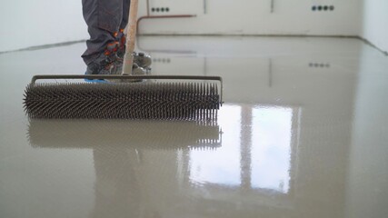 A contractor painter will paint the garage floor to speed up the sale of your home. Floor screed...