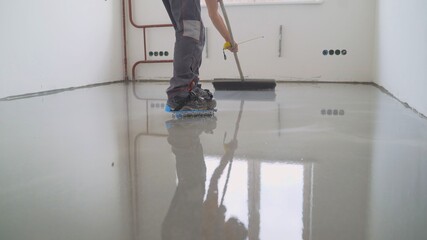 Filling the floor. A contractor painter will paint the garage floor to speed up the sale of your...