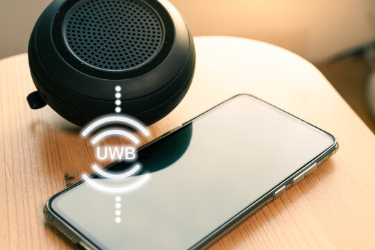 UWB or ultra wireband radio technology speaker connecting to a smartphone
