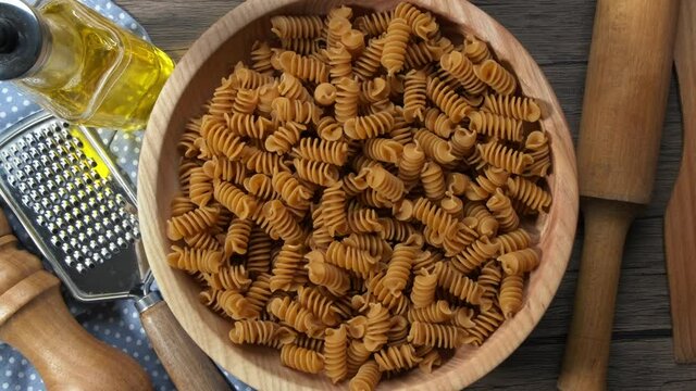 Close up image of Buckwheat Fusilli pasta. Slow rotation close up