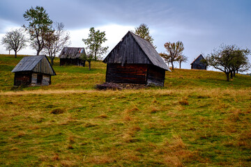 Colorful autumn landscape in the Romanian Carpathians, Fantanele village, Sibiu county, Cindrel mountains, 1100m, Romania