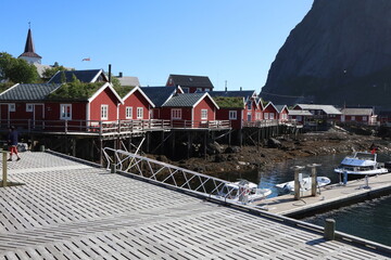 Reine / Norway - June 15 2019: Red cabins, called Robu / Rorbuer in norway with grass roofs