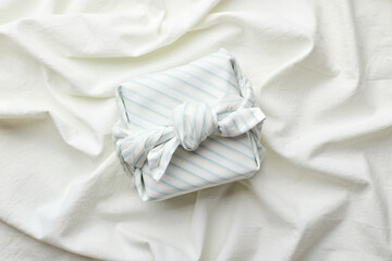 Eco-friendly gift wrap in traditional japanese furoshiki style, eco-friendly gift wrap and Zero Wast concept