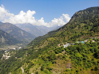 Fototapeta na wymiar Aerial landscape in the mountains. Bird eye view taken through a drone