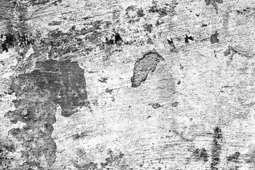 Texture of a concrete wall with cracks and scratches which can be used as a background