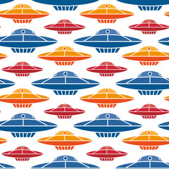 Bright colorful colored flying saucers isolated on white background. Cute ufo seamless pattern. Horizontal view. Vector flat graphic illustration. Texture.