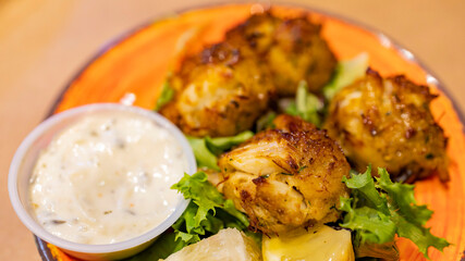 Close up shot of deep fried crab cake