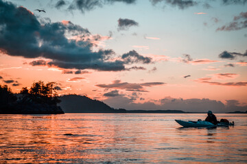 sunset sea kayaker