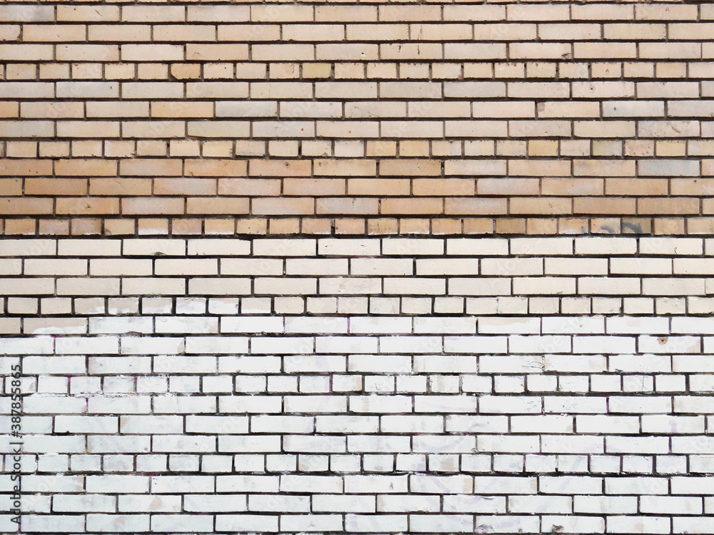 Canvas Prints Three different colors brickwork. Urban city brick wall with sloppy white color paint smudge. Background or backdrop for web design or banner with copy space.