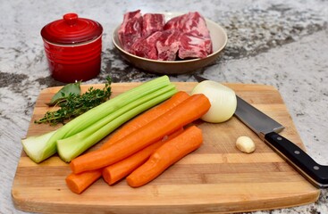 Staple ingredients for making homemade winter soups and stews for family meals and freezing for quick dinners