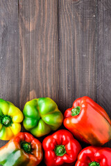 Fresh red, orange, green and yellow sweet bell paprika close up.fresh pepper on the table. background with bell peppers. Healthy lifestyle.