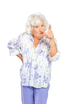 A senior elderly woman in a floral print blouse isolated on a white background.