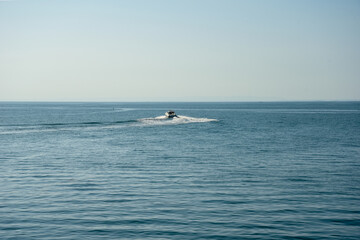Hull Surfing in the Sea by Morning