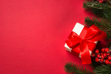 Fototapeta na wymiar Christmas flat lay background with fir tree and decorations.