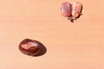 Polished Carnelian Gemstone & Sunstones Used to Balace 2nd Chakra in Crystal Healing