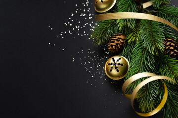 Christmas deco with fir and baubles on dark