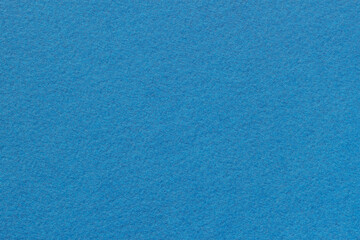 Texture of blue craft paper for artwork. Modern background, copy space