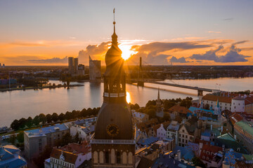 Magical stormy sunset over Riga old town - the capital of Latvia. Stormu clouds forming in the sky....