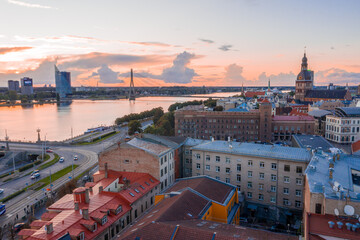 Magical stormy sunset over Riga old town - the capital of Latvia. Stormu clouds forming in the sky....