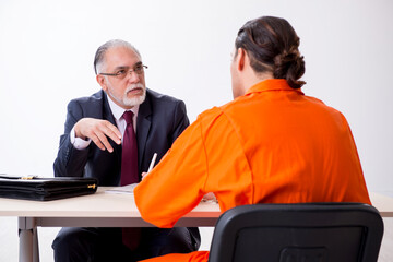 Young captive meeting with advocate in pre-trial detention