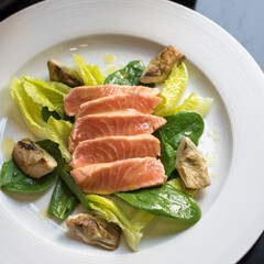 Seared Salmon Slices, Grilled Artichoke and Green Leaf Salad