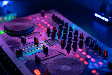 audio controller on mixing dj party