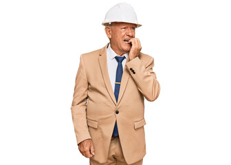 Senior caucasian man wearing architect hardhat looking stressed and nervous with hands on mouth biting nails. anxiety problem.