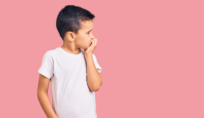 Couple of little brothers together wearing casual clothes looking stressed and nervous with hands...