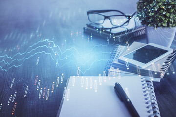 Double exposure of forex chart drawing and cell phone background. Concept of financial trading