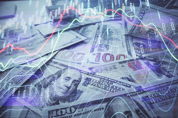 Multi exposure of forex chart drawing over us dollars bill background. Concept of financial success markets.