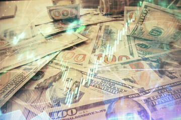 Multi exposure of forex chart drawing over us dollars bill background. Concept of financial success markets.