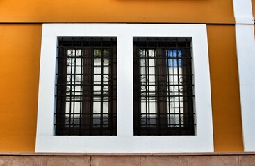 Typical vintage Spanish facade with old window
