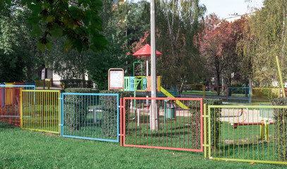 Obraz na płótnie Canvas children's colorful playground, in the autumn park