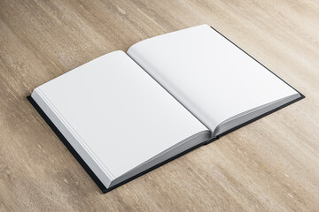 Abstract open book standing on wooden table.